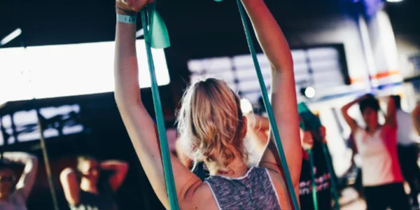 Woman in group exercise class.