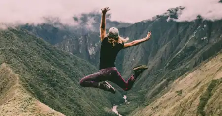 Woman is jumping because she is pain-free.